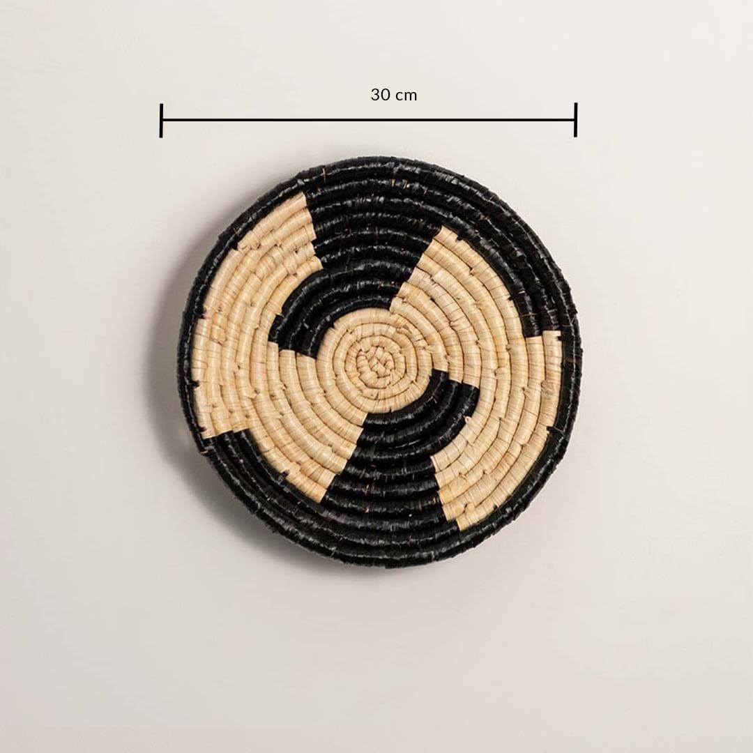 Dimension image of handcrafted black cream woven seagrass wall basket with geometric block pattern for boho wall decor.