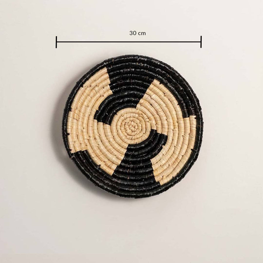 Dimension image of handcrafted black cream woven seagrass wall basket with geometric block pattern for boho wall decor.