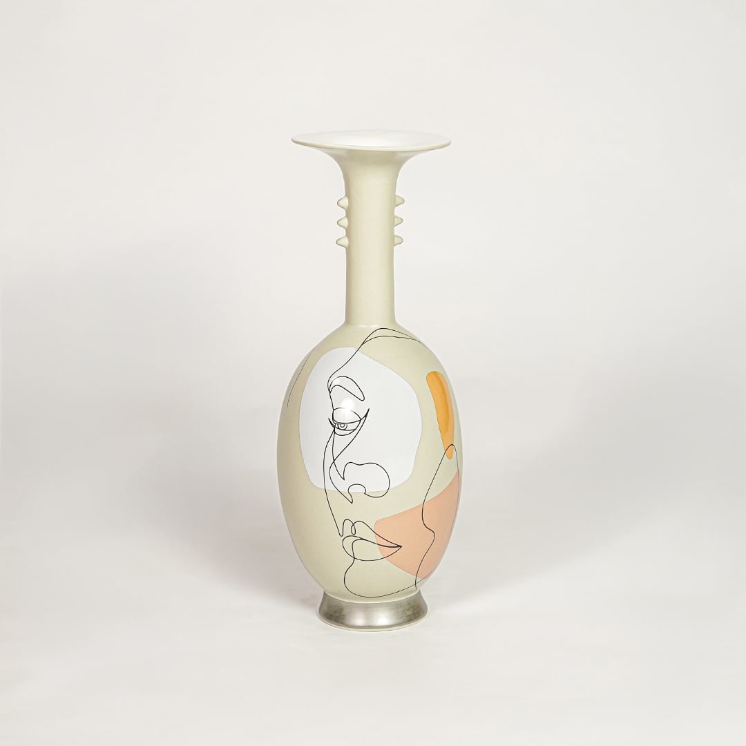 Liz origami ceramic flower vase with angular textured form isolated on white background for modern tabletop decor use.
