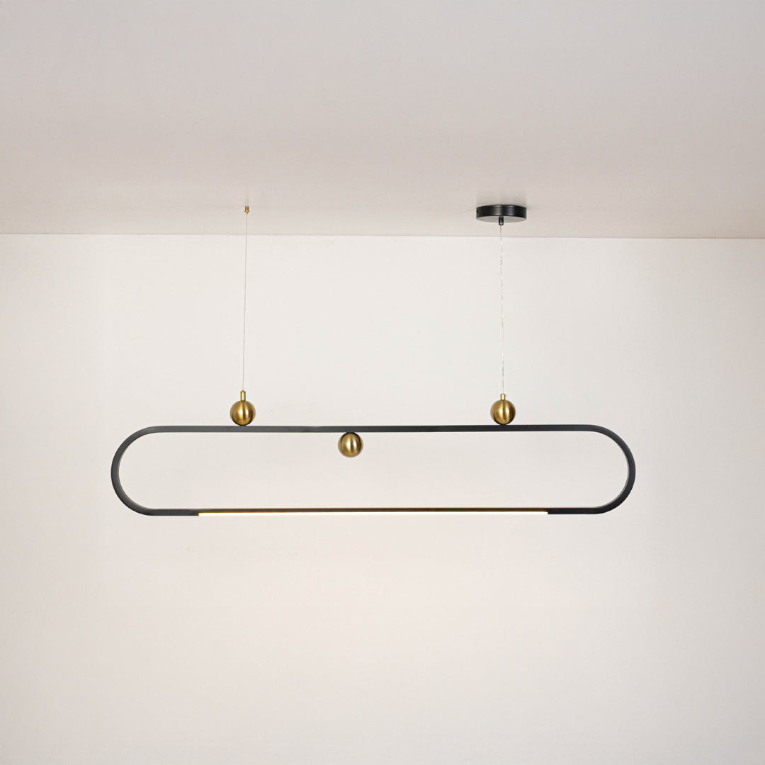 Black metal linear pendant light with exposed globe bulbs designed for stylish contemporary ceiling lighting interiors.