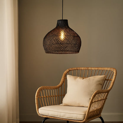 Modern black rattan pendant light adding warmth and elegance to any living or dining space with its natural woven charm.