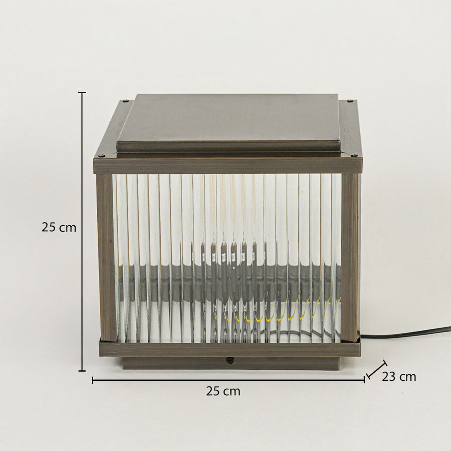 Modern outdoor wall light with rectangular metal frame and ribbed glass diffuser on neutral background 25 cm height 25 cm width 23 cm depth perfect for exterior decor lighting.