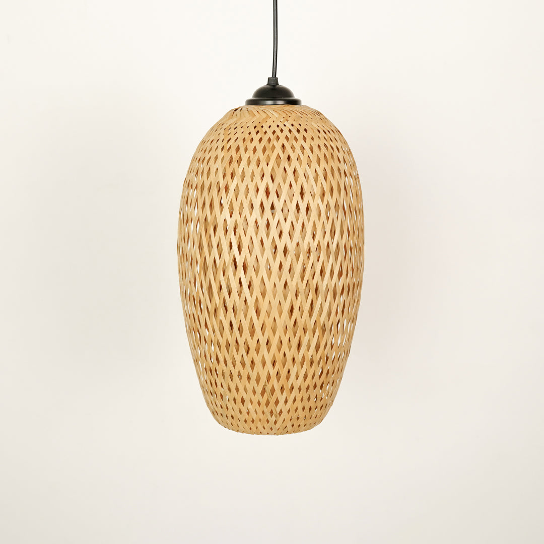 Handwoven rattan pendant light with intricate weave crafted for organic home decor.