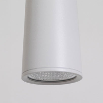 Detailed closeup of matte white metal pendant light showcasing the textured diffuser and premium minimalist design.