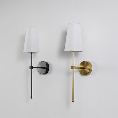 Collection of stylish white drum shade wall sconces with black metal frames displayed off together on clean white backdrop.