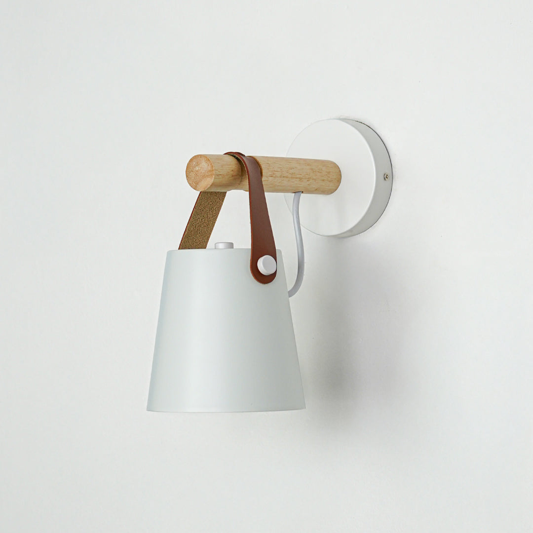 Modern white metal wall light with wooden accents for elegant minimalist interior lighting decor.