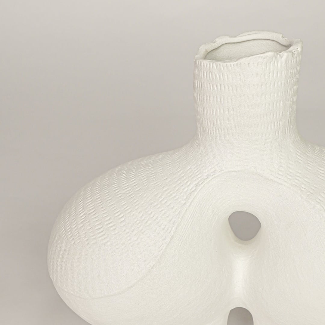 bums ceramic vase white closeup