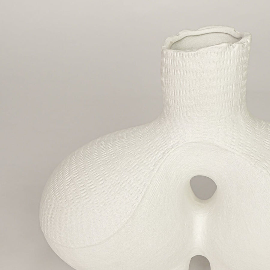 bums ceramic vase white closeup