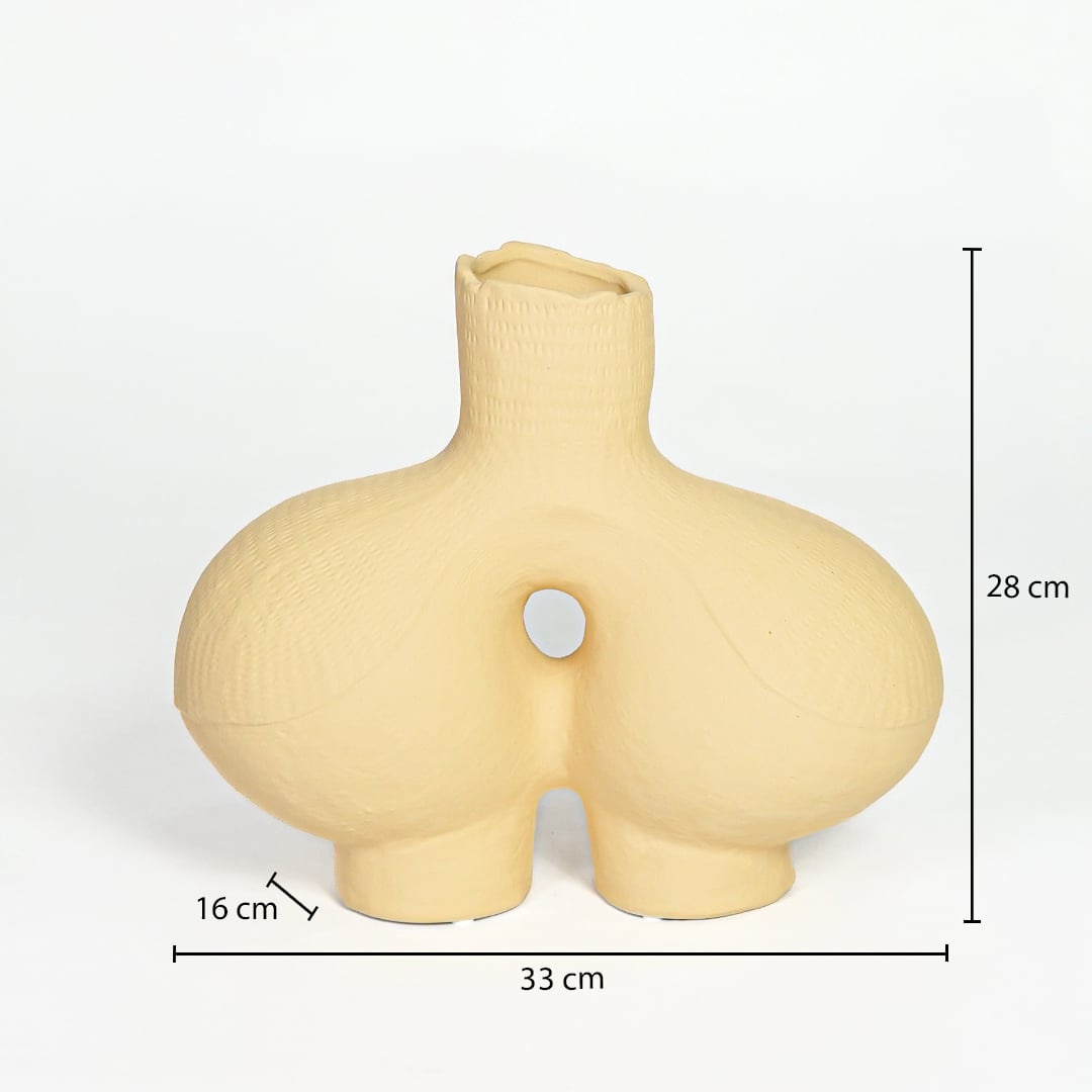 Beige ceramic abstract vase 28 cm height 33 cm width ideal for console table and living room decor.