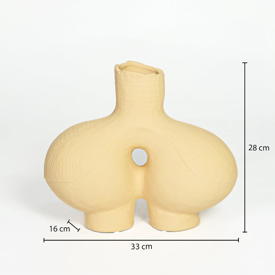 Beige ceramic abstract vase 28 cm height 33 cm width ideal for console table and living room decor.
