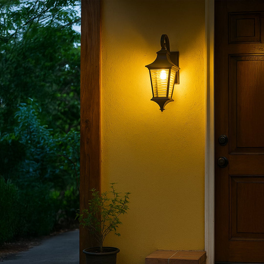 Classic outdoor wall lantern creating a welcoming glow for residential exterior lighting decor.