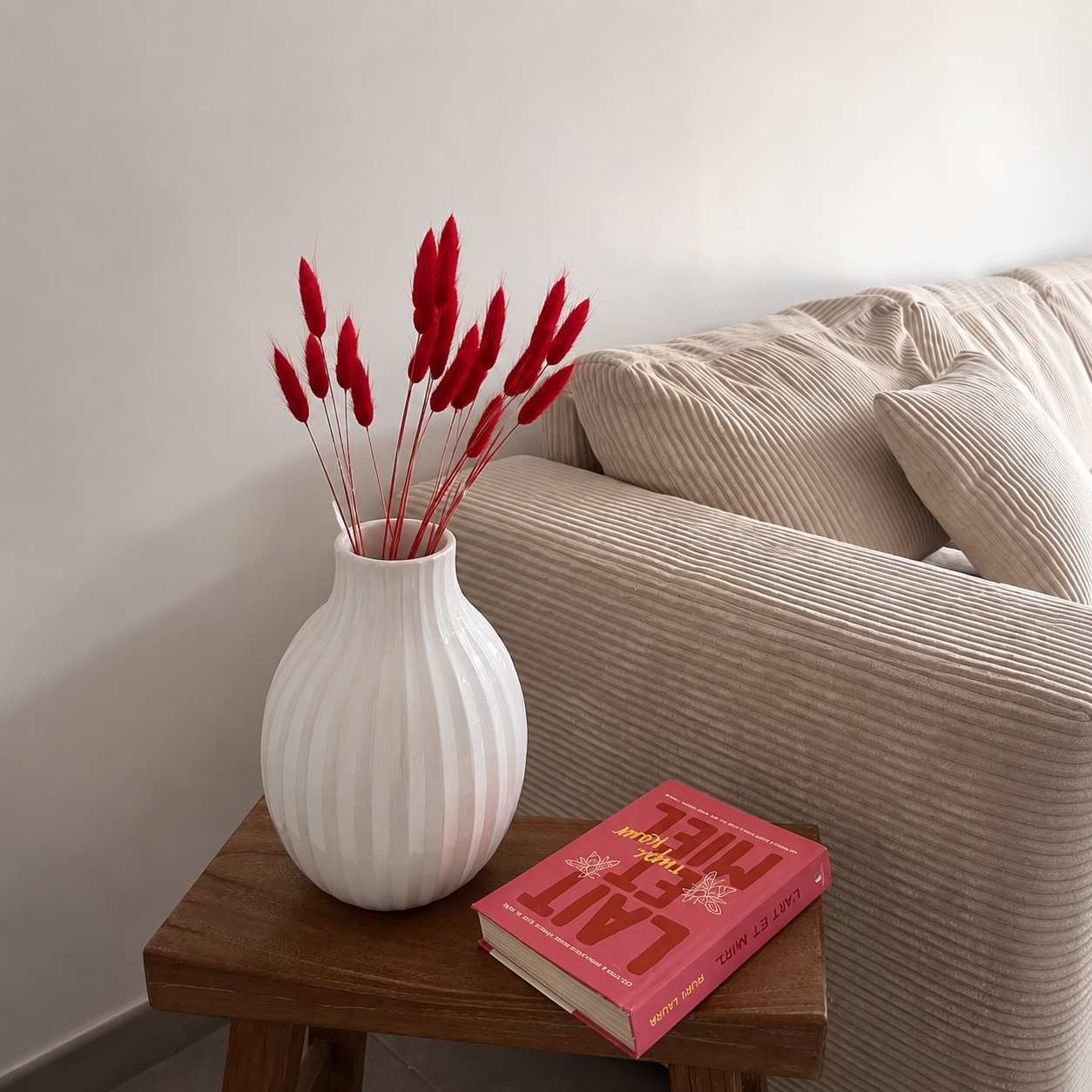 Lifestyle image of red bunny tail dried pampas grass for elegant home interior decor styling and modern room table decor.