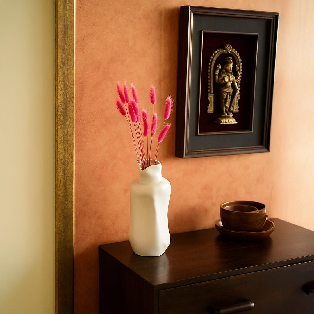 Vibrant pink bunny tail grass arranged in a cozy home scene bringing soft fluffy texture to interior decor.