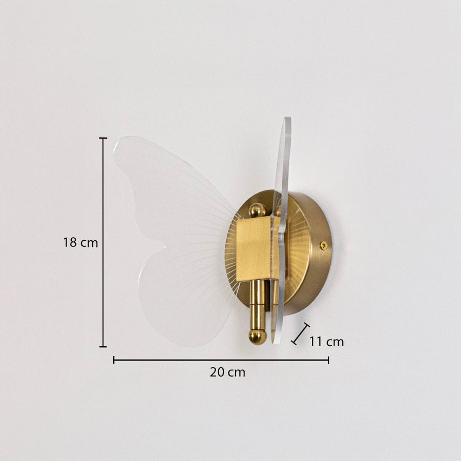 Gold butterfly wall light with clear acrylic wings shown with 18 cm height and 20 cm width for precise sizing.
