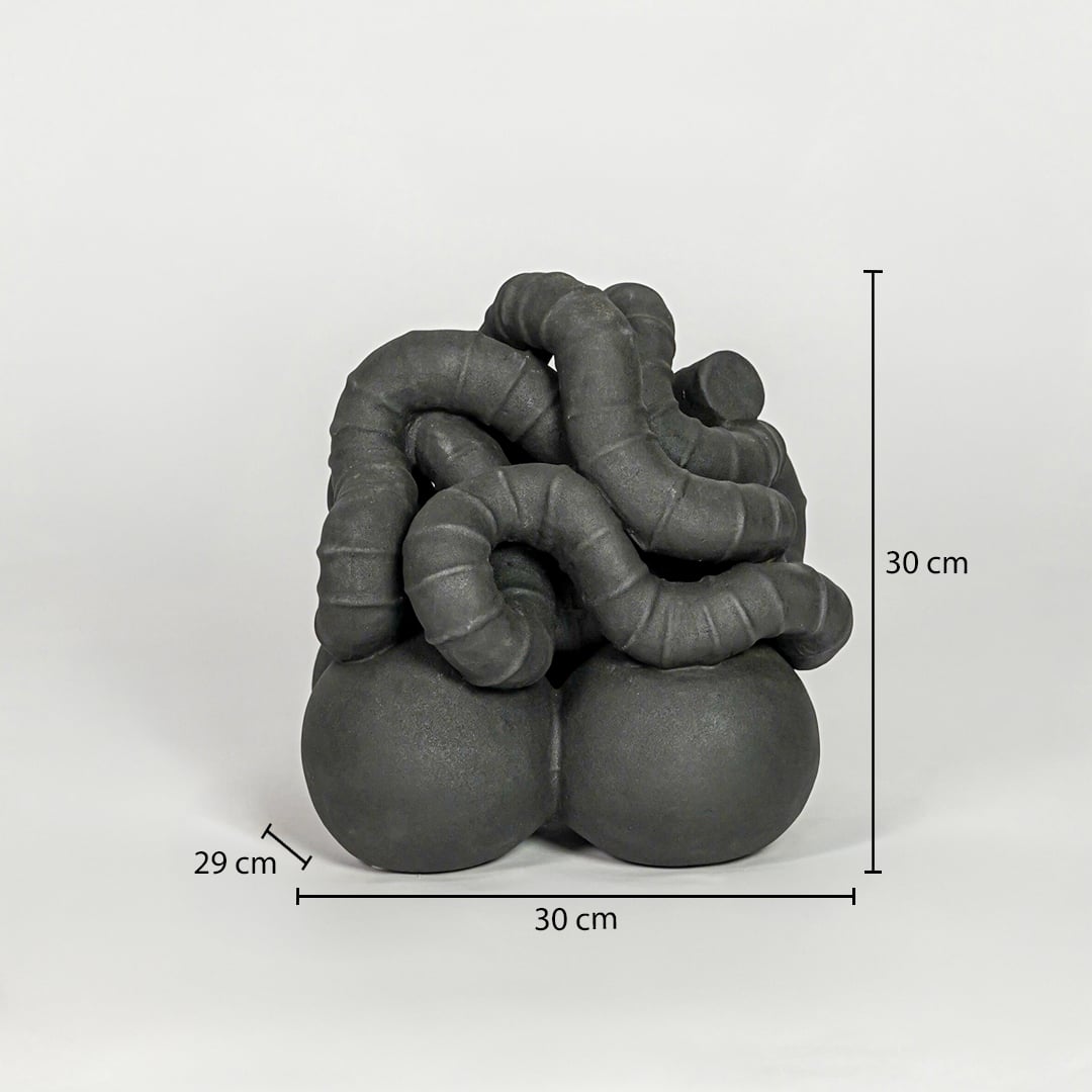 Black ceramic abstract decor sculpture size 33 cm height 30 cm width 29 cm depth modern showpiece for table console styling.