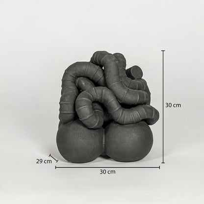 Black ceramic abstract decor sculpture size 33 cm height 30 cm width 29 cm depth modern showpiece for table console styling.