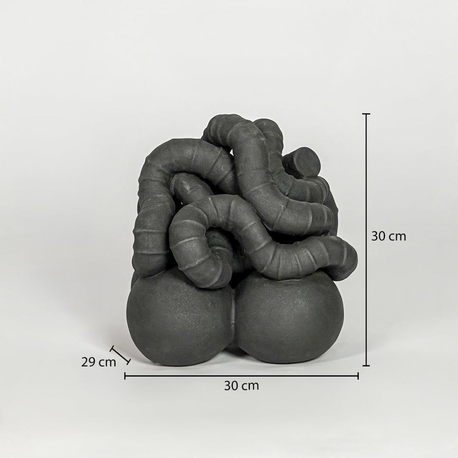 Black ceramic abstract decor sculpture size 33 cm height 30 cm width 29 cm depth modern showpiece for table console styling.