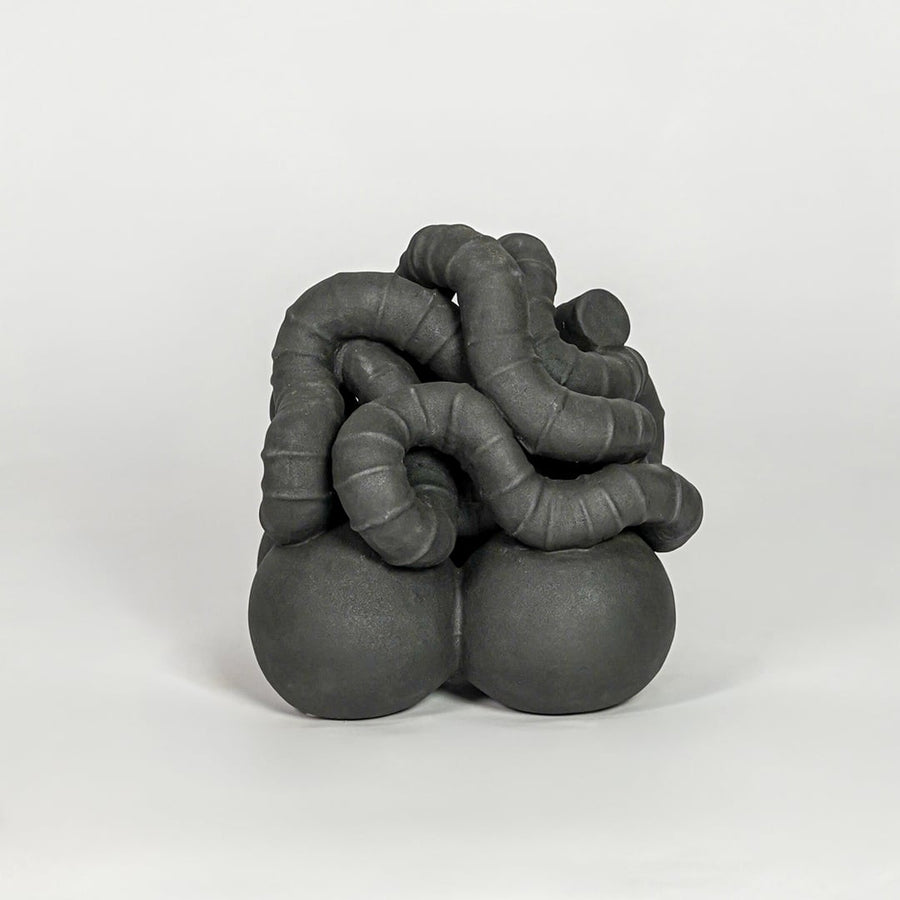 Black ceramic abstract decor sculpture modern decorative showpiece for table console shelf home decor styling.