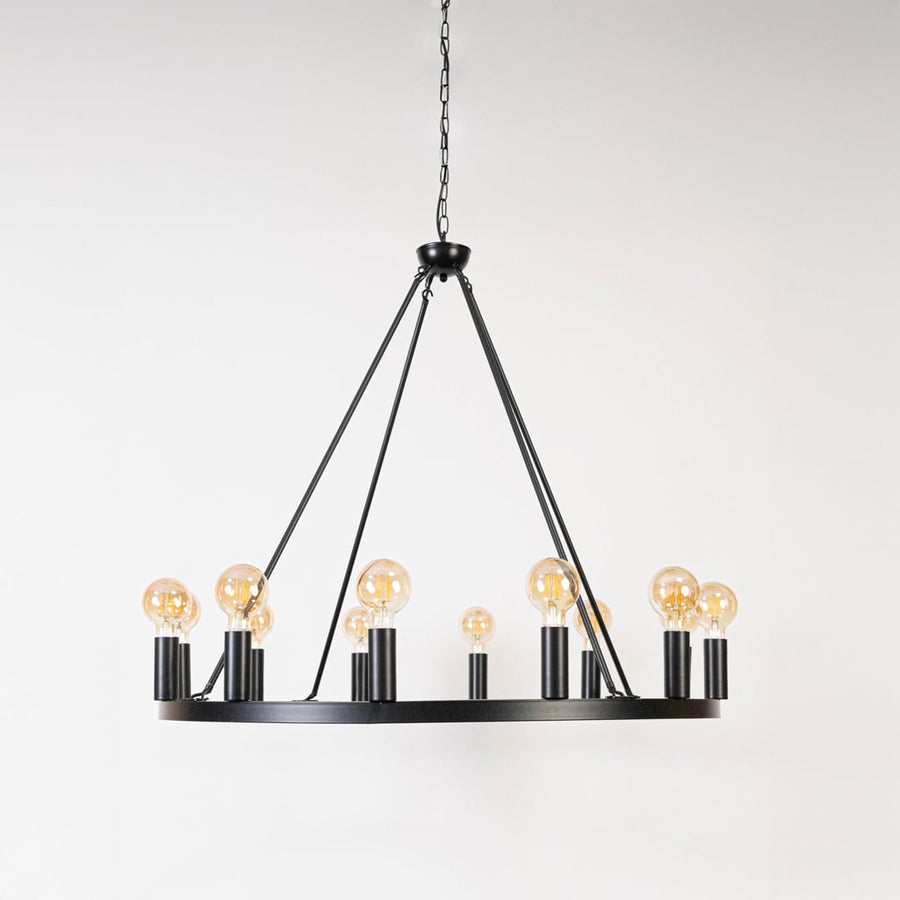 Contemporary black metal ring chandelier with chain and Edison bulb sockets turned off displayed on clean white background.