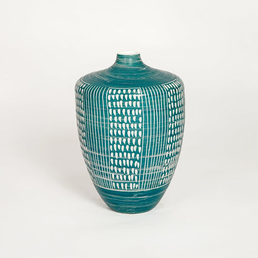 Handcrafted teal ceramic flower vase with white linear texture ideal for modern home decor shelf or entryway table.