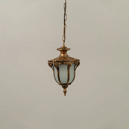 Unlit black metal garden hanging light fixture with chain and frosted glass panels isolated against a plain white background.