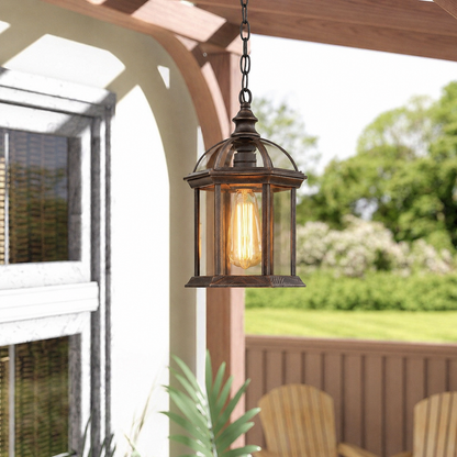 Vintage bronze metal hanging porch lantern light with clear glass panels for wooden deck pergola outdoor ceiling styling.
