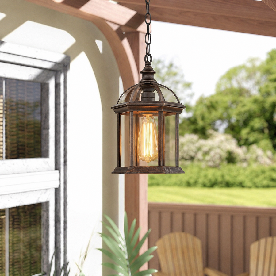 Vintage bronze metal hanging porch lantern light with clear glass panels for wooden deck pergola outdoor ceiling styling.