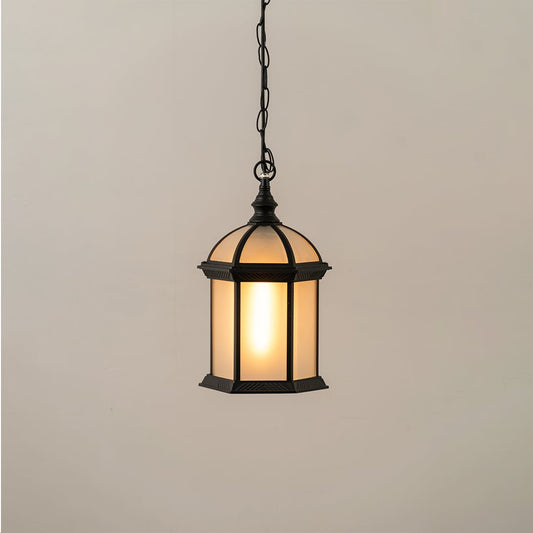 Black vintage hanging lantern on white background with light on showing warm frosted glow and classic dome top design ideal for exterior ceiling lighting.