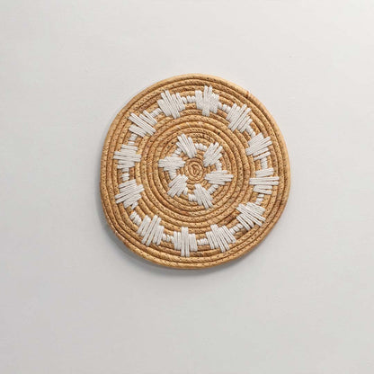 Natural carved wooden wall decor with floral star design for elegant wall styling and contemporary home decor.