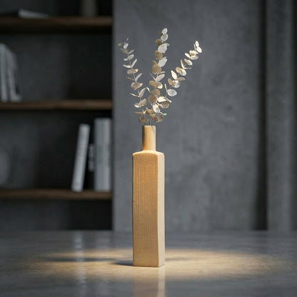 Yellow ceramic tall flower vase placed on table modern decorative vase for living room console shelf home decor styling.