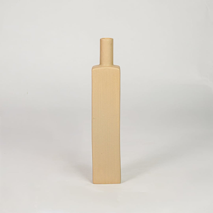 Yellow ceramic tall decorative vase with ribbed texture modern flower vase for tabletop shelf console living room decor styling.
