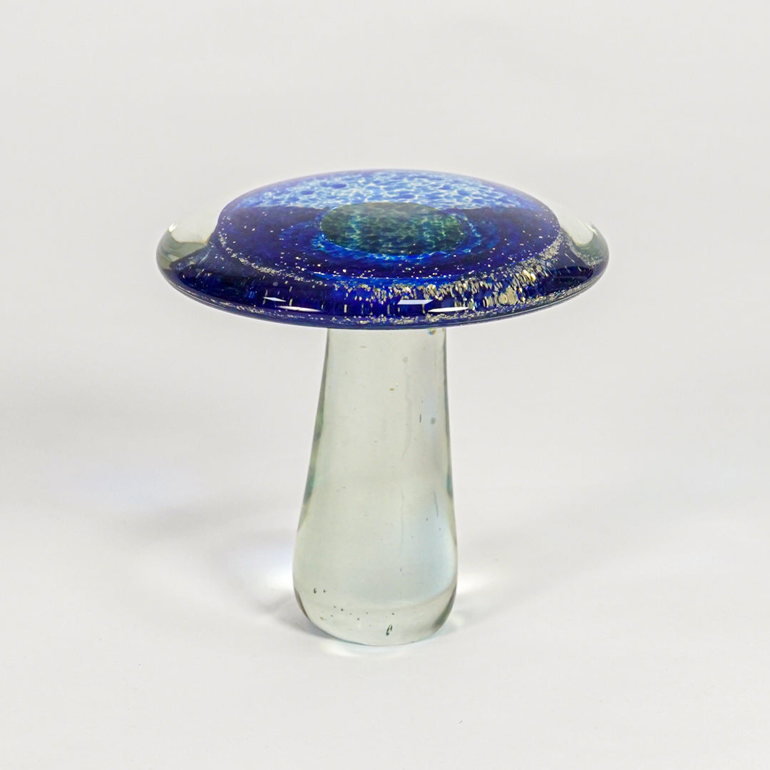 Unique blue mushroom shaped glass artistic vase for creative home decor and distinctive tabletop accent styling.