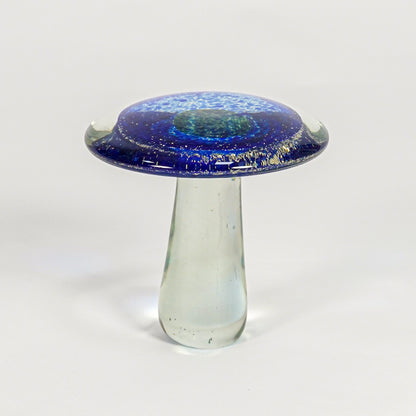 Unique blue mushroom shaped glass artistic vase for creative home decor and distinctive tabletop accent styling.