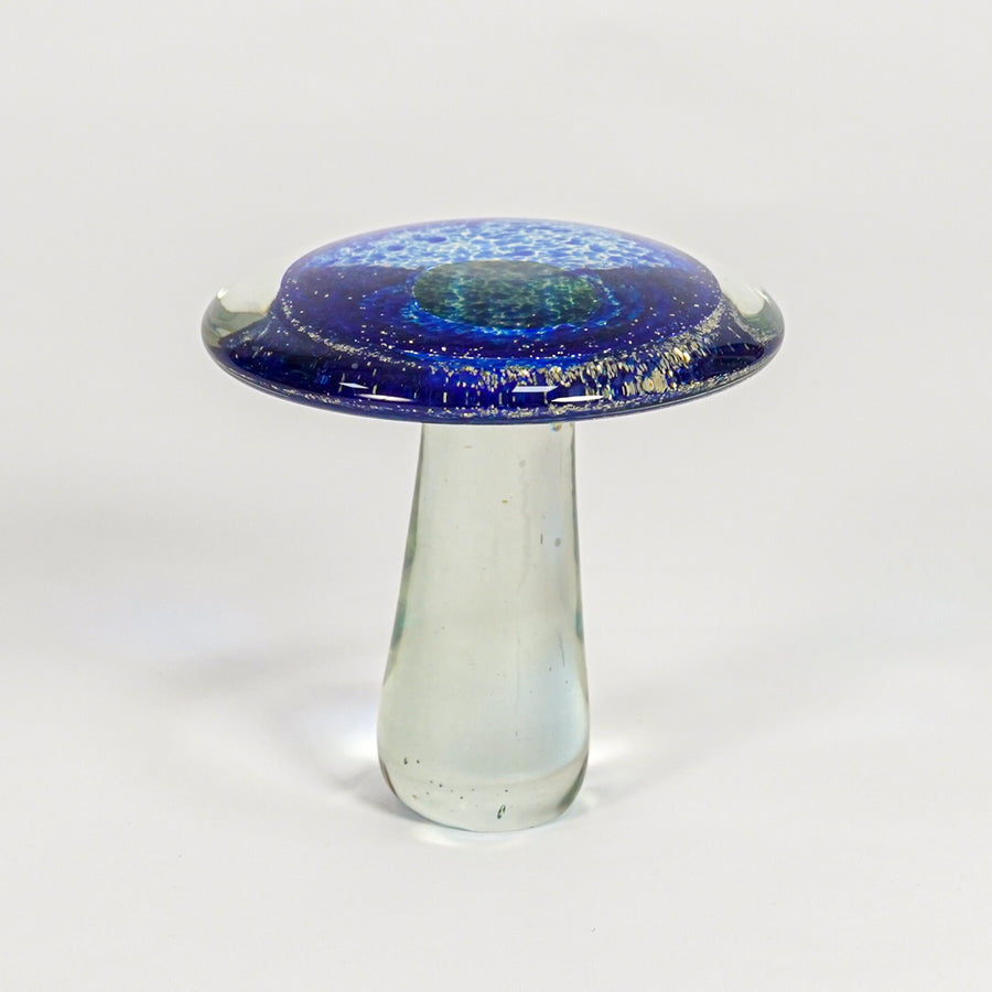Unique blue mushroom shaped glass artistic vase for creative home decor and distinctive tabletop accent styling.
