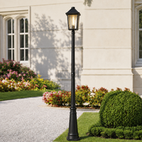 Traditional black aluminum garden lamp post light for a premium estate gravel pathway walkway outdoor landscape styling.