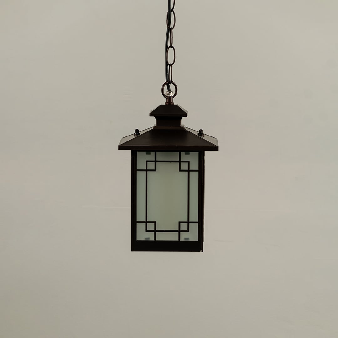 Black metal hanging lantern on white background with light off showing frosted glass panels and square geometric frame suitable for modern exterior ceilings.