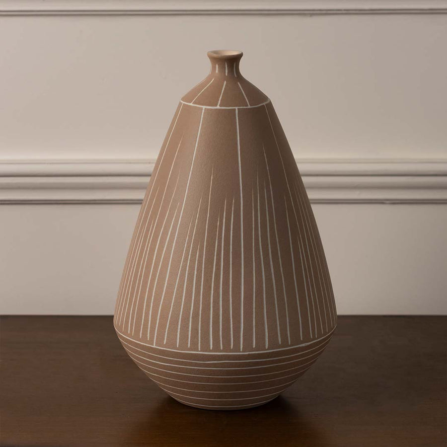 Brown ceramic vase with white linear pattern styled for modern living room and table decoration on plain white background.