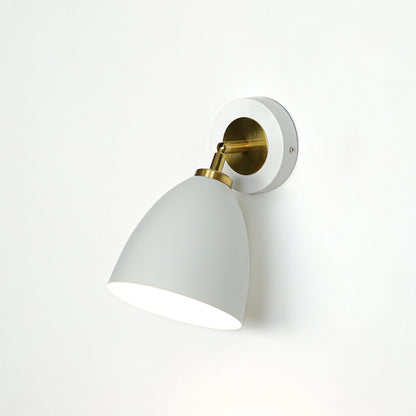 Modern white and gold metal wall light mounted on white wall for elegant bedroom hallway and living room decor.