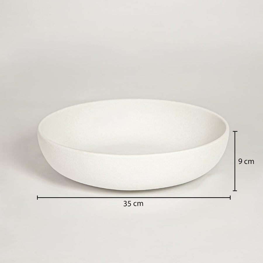 White ceramic wide decorative bowl measuring 9 cm height and 35 cm width ideal for modern tabletop decor styling.