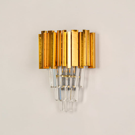Elegant gold metal and crystal wall light switched off on white background designed for decorative wall mounted lighting.