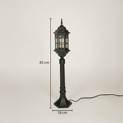 Vintage style outdoor lamp post with black metal frame and glass lantern design 85 cm height 18 cm base width ideal for garden pathway lighting.

