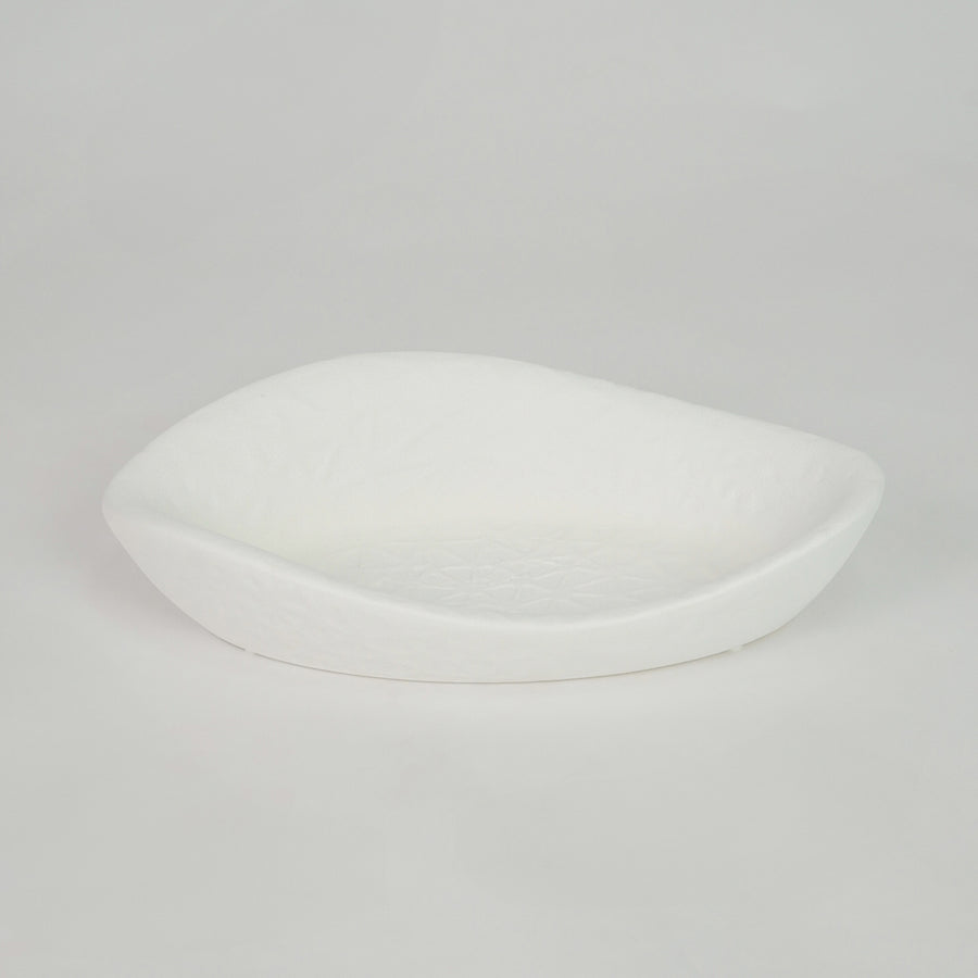 White ceramic decorative tray for modern coffee table placement and elegant indoor home decor styling accent piece.
