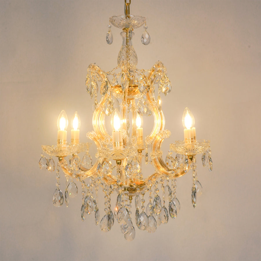 White background image of candelabra chandelier for modern living room decor styling with a bright warm glow.