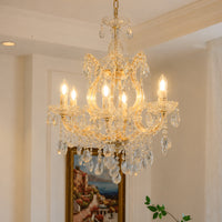 Lifestyle image of candelabra chandelier for luxury living room decor styling with elegant detailing.