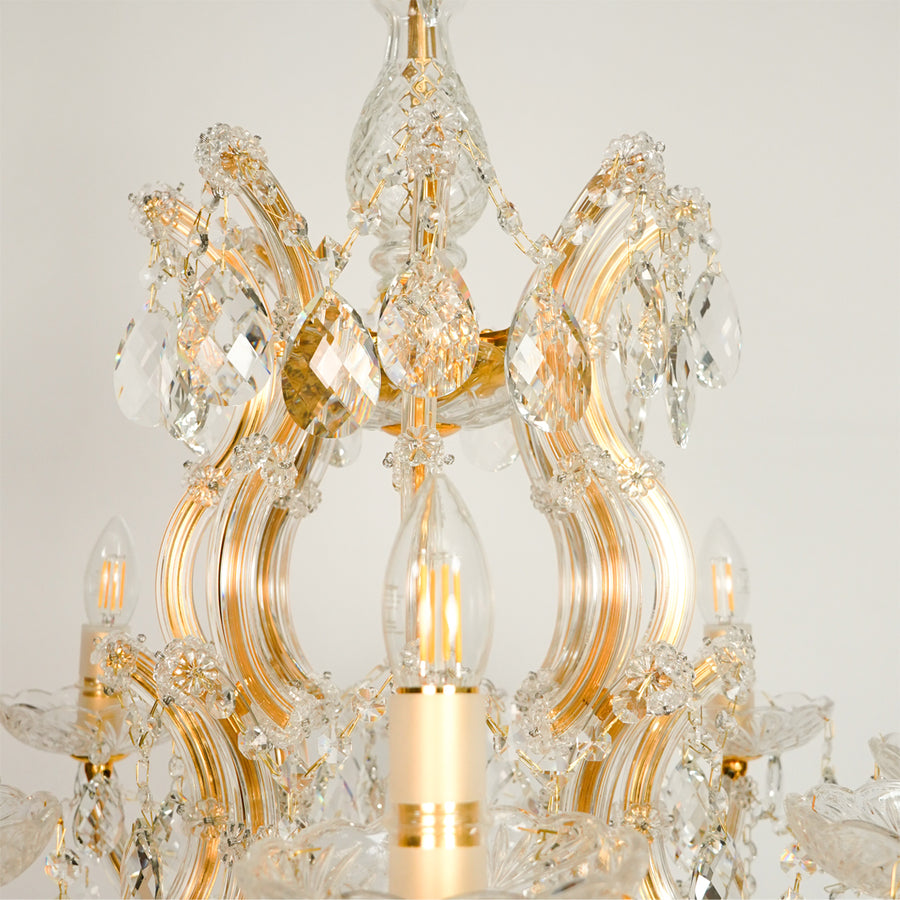 Closeup image of large candelabra chandelier for modern dining room decor styling with elegant detailings.