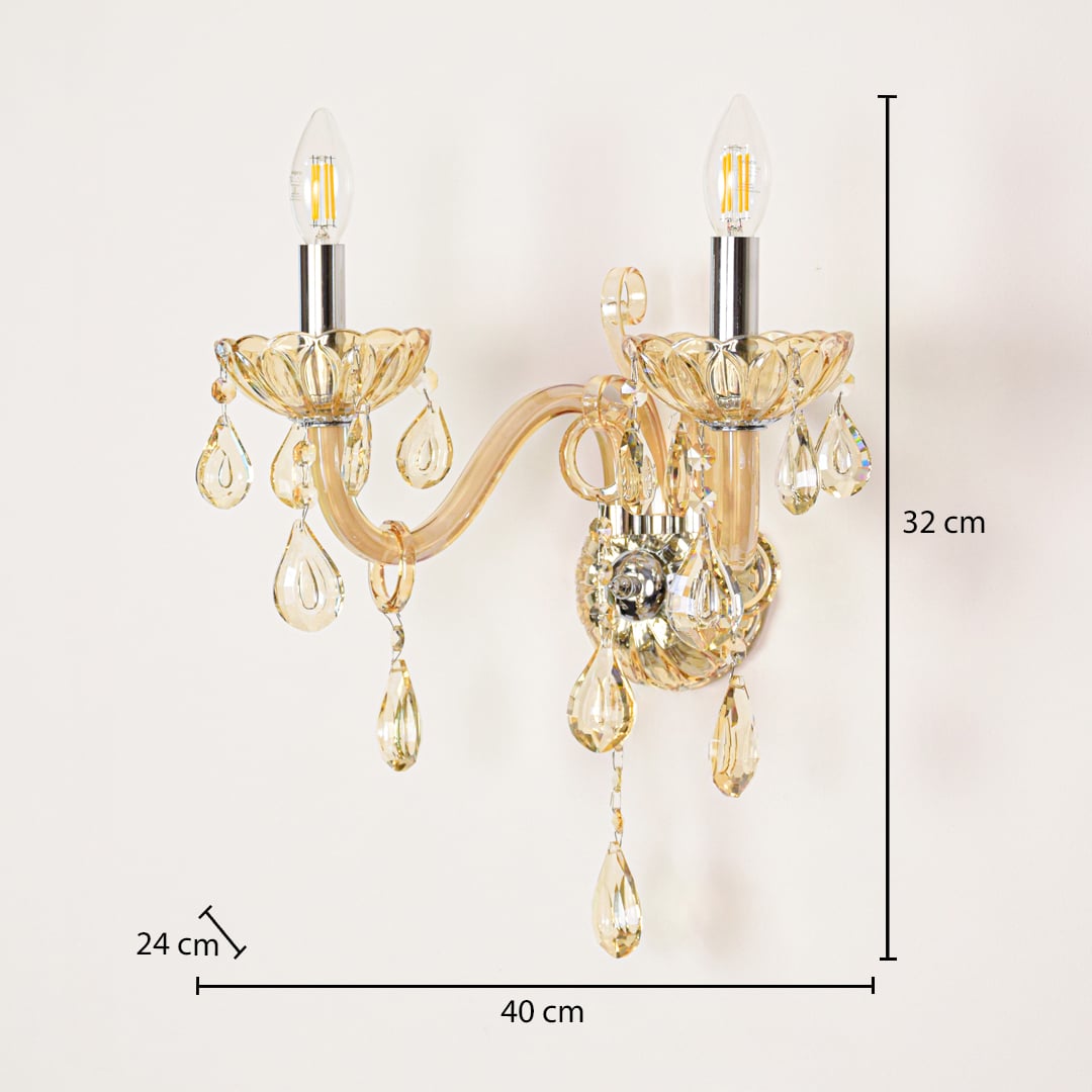 Golden crystal wall light sized 32 cm height and 40 cm width with 24 cm depth ideal for elegant hallway or living room walls.