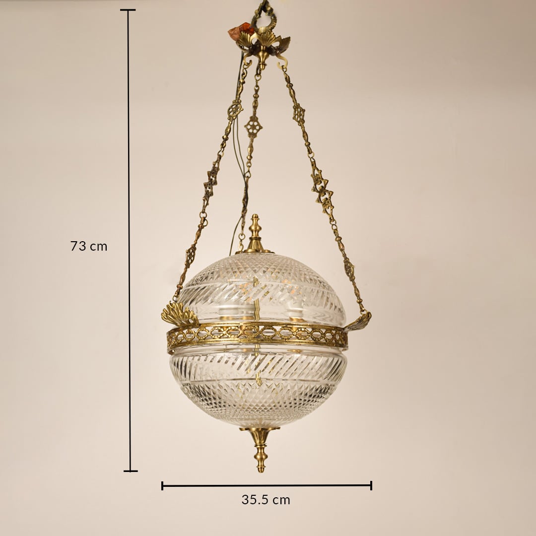 Gold metal hanging planter with 44 cm width and 72 cm height for stylish indoor placement.
