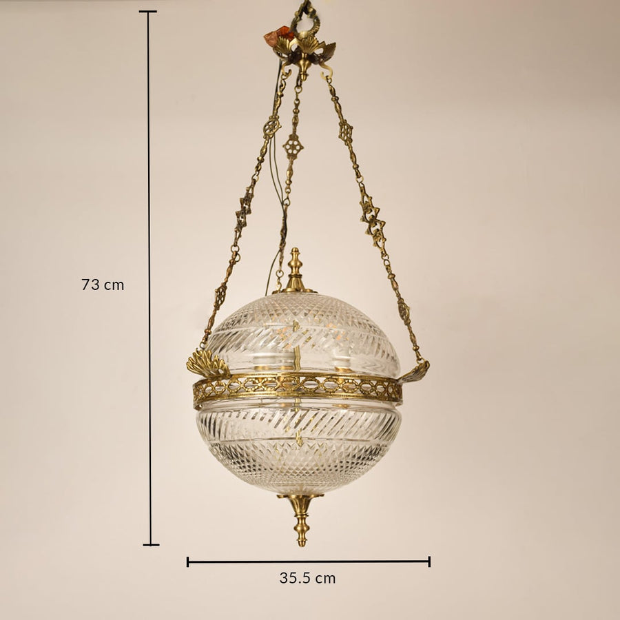 Gold metal hanging planter with 44 cm width and 72 cm height for stylish indoor placement.