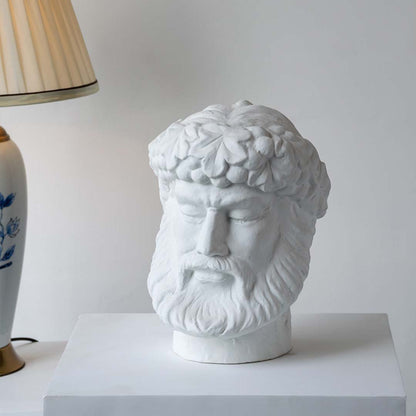 White ceramic decorative face sculpture with classical portrait design for elegant tabletop styling and modern home decor.