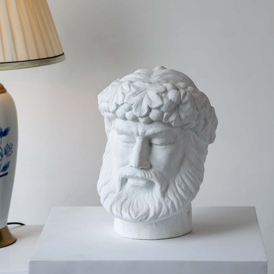 White ceramic decorative face sculpture with classical portrait design for elegant tabletop styling and modern home decor.